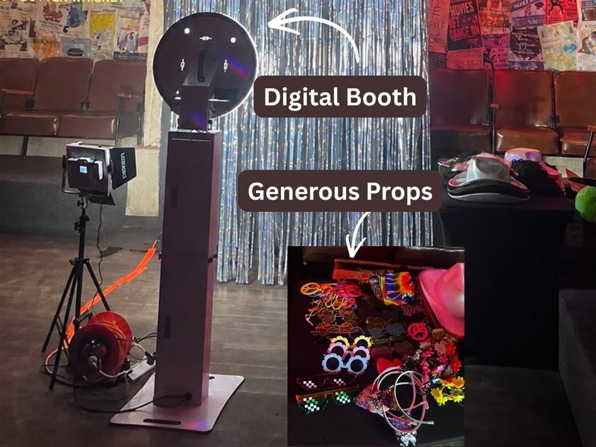 The Fotobooth Perth digital photo booth set up beside a shimmer backdrop with a full prop table at a Perth venue