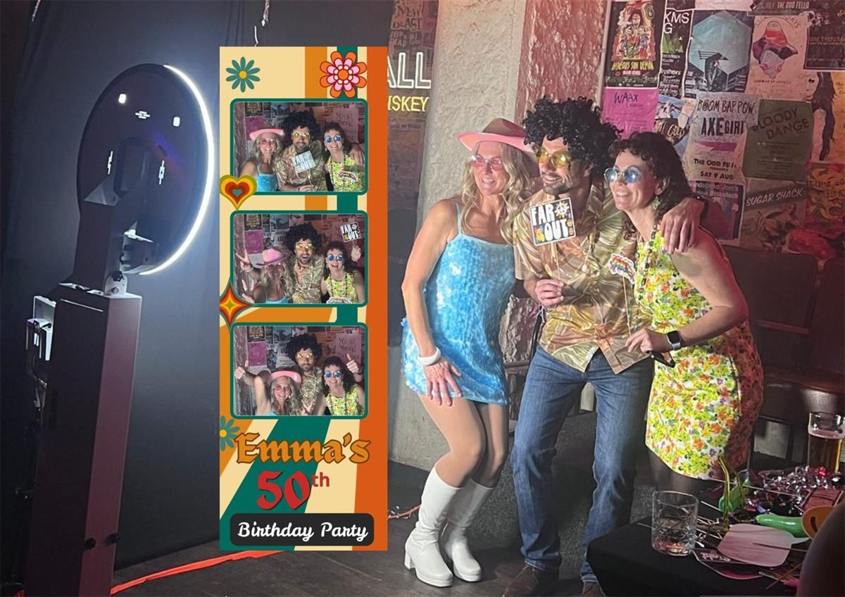 Three guests in 1970s costume posing at a Fotobooth Perth booth at a 50th birthday party at Frankie's Bar in Fremantle, with their retro-themed photo strip alongside