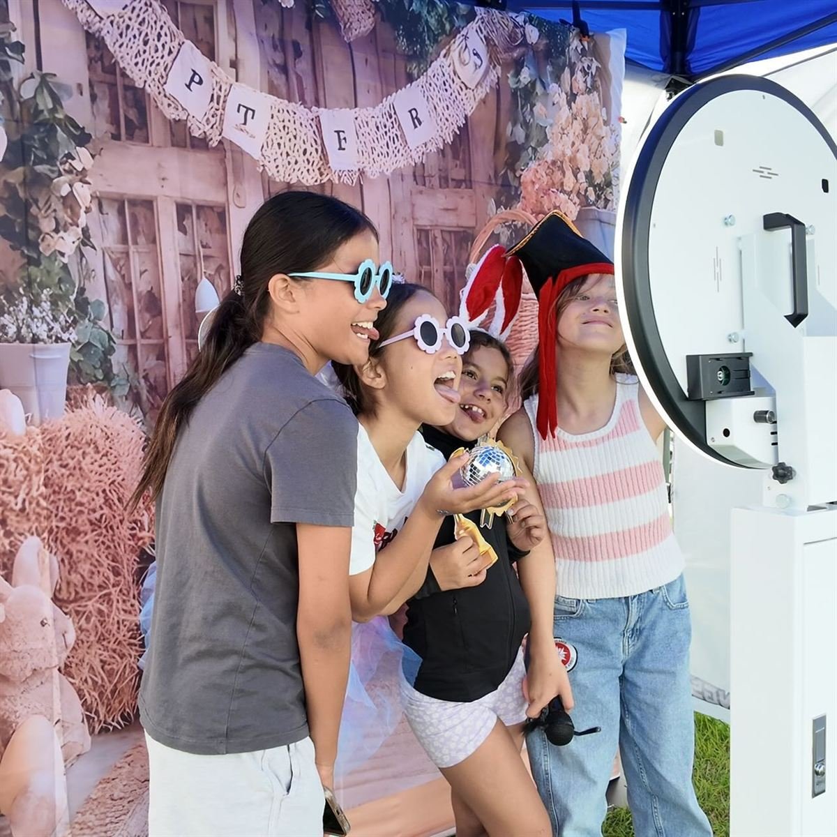 Guests at a Perth corporate event photo booth
