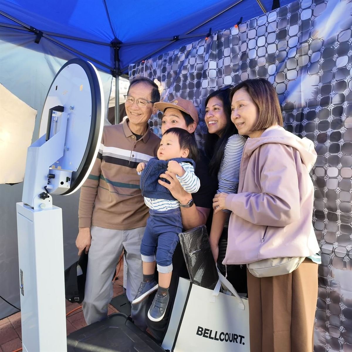 Friends posing at a Fotobooth Perth booth