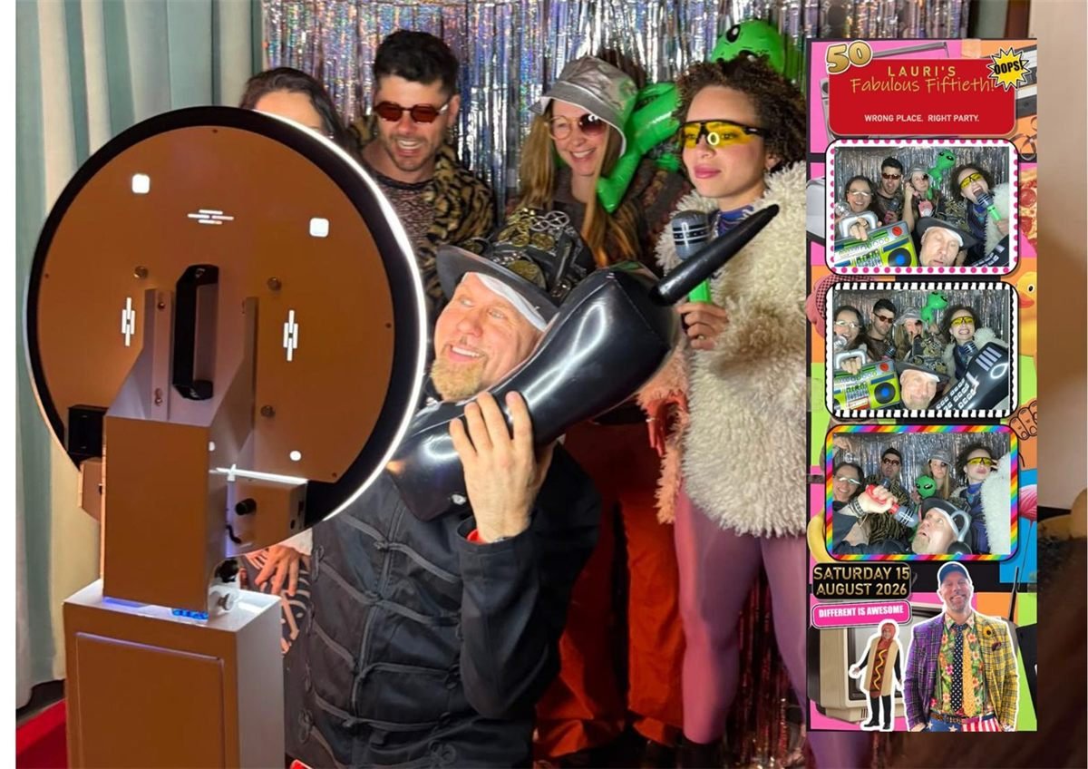 Guests in 80s and misfit costume crowding around a Fotobooth Perth ring-light booth at a 50th birthday at the Raffles Hotel in Applecross, with their photo strip alongside
